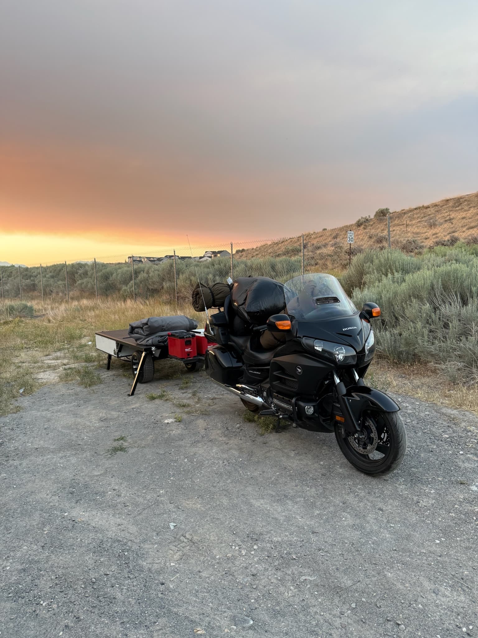 Ultra Compact Conestoga trailer with its airframe tent deployed at camp